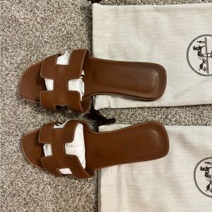 Hermes Oran sandal	 - gold piqûres écrues